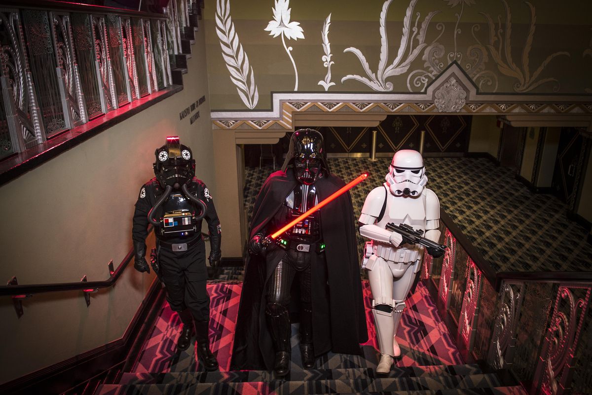 Members of Garrison Titan of the 501st Legion, left to right, TIE fighter pilot (Dave Turner), Darth Vader (Kevin Parker) and stormtrooper (Adam Blake) visit the Fox Theater to help promote the upcoming Spokane Symphony performance of “The Music of ‘Star Wars’: The Symphony Awakens.” (Colin Mulvany / The Spokesman-Review)