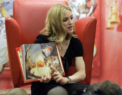 
THE AUTHOR: Madonna reads from her new book 