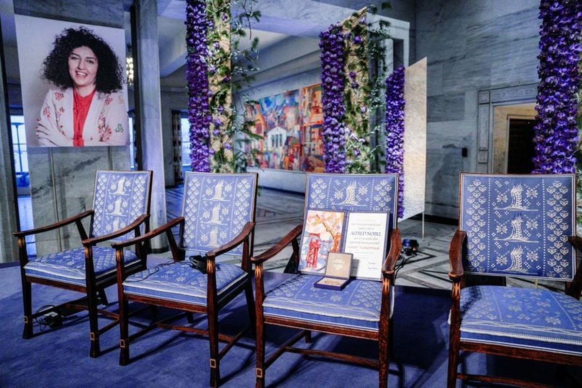 An empty space showing that Nobel Peace Prize winner Narges Mohammadi was not present during the award ceremony at Oslo City Hall, Wednesday.   (Reuters )