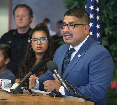 Burien Mayor Jimmy Matta speaks at a news conference Monday about being assaulted last Saturday at a public event over the city’s sanctuary-city status. With him is his daughter, Maya, 15, and Burien Police Chief Ted Boe. (Steve Ringman / Seattle Times)