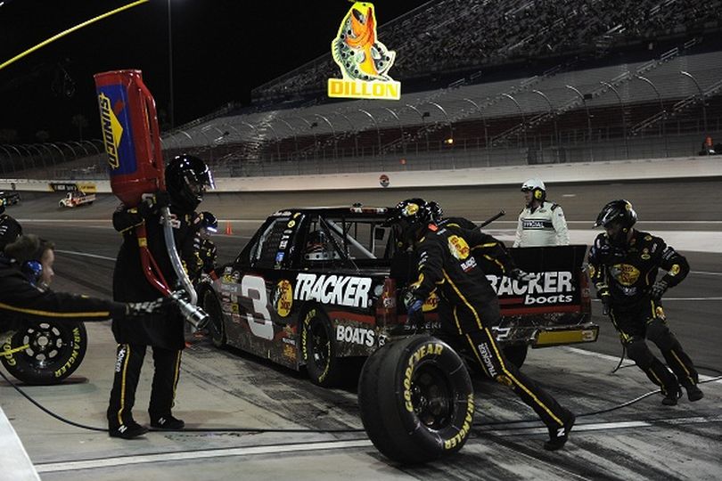 The Richard Childress Racing crew of the Bass Pro Shops / Remington / Tracker Boats Chevrolet services Austin Dillon's ride during the NASCAR Camping World Truck Series Smith's 350 Saturday at Las Vegas Motor Speedway. (Photo courtesy of Harry How/Getty Images) (Harry How / Getty Images North America)