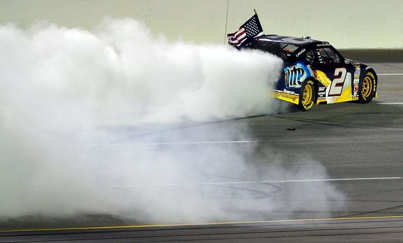 Brad Keselowski, driver of the No. 2 Miller Lite Dodge, celebrates with a burnout after winning the NASCAR Sprint Cup Series Quaker State 400 at Kentucky Speedway on Saturday in Sparta, Ky. (Photo Credit: Rainier Ehrhardt/Getty Images for NASCAR) (Rainier Ehrhardt / Getty Images North America)
