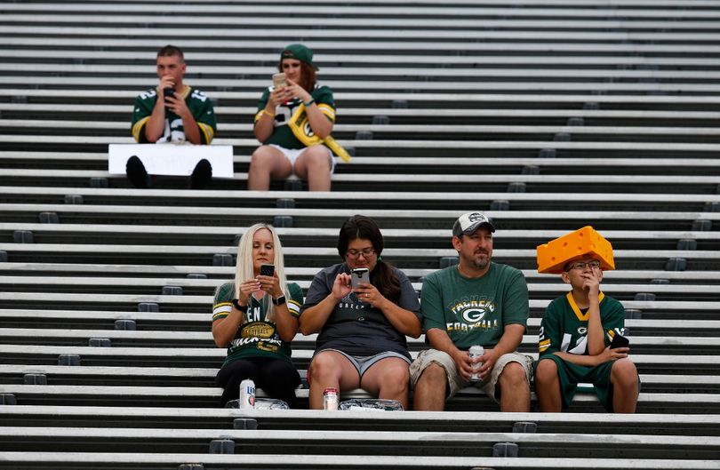 The Parting Shot today amuses me. Notice that 4 of the 6 people pictured are on their cellphones. Here, they're at a football preseason game -- and they simply can't take in the fun and feel of that. They have to be on there cellphones, rather than communicate with one another. I love cellphones. But I