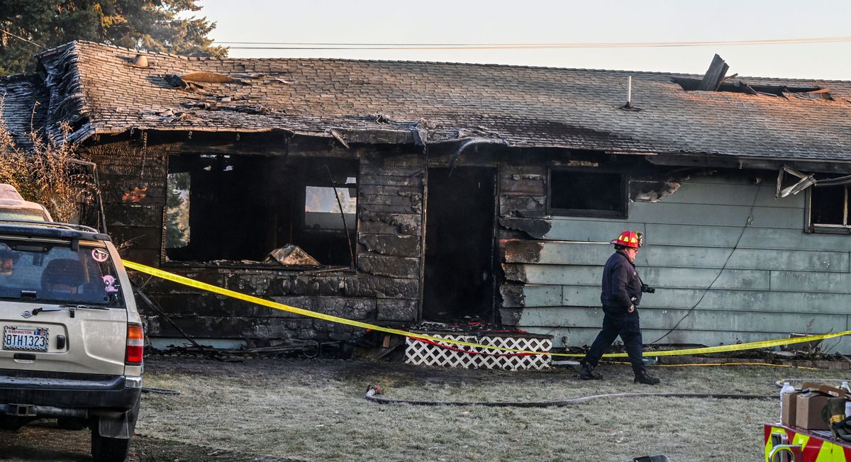 Spokane Valley Fire inspector Kip Krogh on scene after a fire at on the 9800 block of east Dalton killed two children, Monday, Oct. 30, 2023, in Spokane Valley.  (DAN PELLE/THE SPOKESMAN-REVIEW)