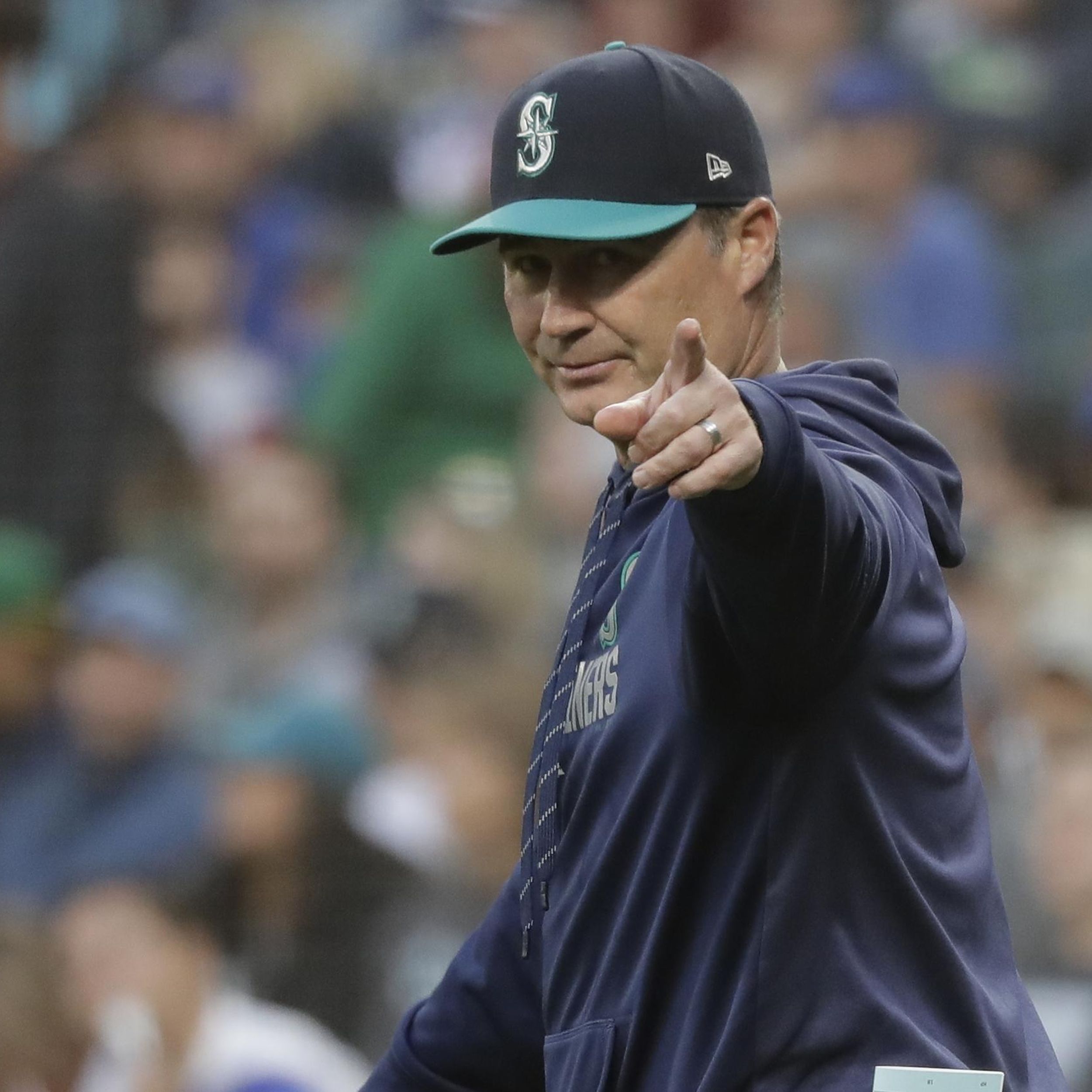 Seattle Mariners manager Scott Servais, bench coach Manny Acta