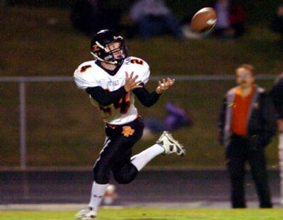 
Randy Hamilton pulls in a pass after outdistancing the Lake City secondary and ran it in for the first touchdown of the game Oct. 12, 2007 at Lake City High. 
 (File / The Spokesman-Review)