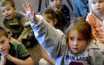 
Twin Lakes Elementary kindergartner Savannah Carr participates in a discussion about library books at the school in Twin Lakes. 
 (Kathy Plonka / The Spokesman-Review)