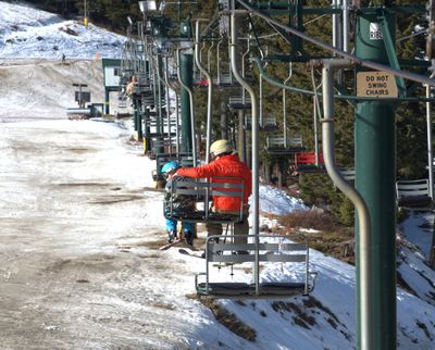 Skiers ride a chairlift at Mt. Spokane Ski and Snowboard Park in early February.  (Michael Wright/The Spokesman-Review)