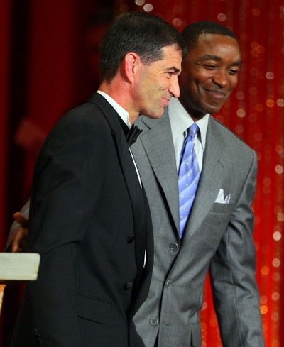 Former Utah Jazz guard John Stockton and his presenter, Hall of Fame NBA player Isiah Thomas, walk off the stage after Stockton's enshrinement ceremony into the Naismith Basketball Hall of Fame in Springfield, Mass., Friday night, Sept. 11, 2009. (Associated Press)