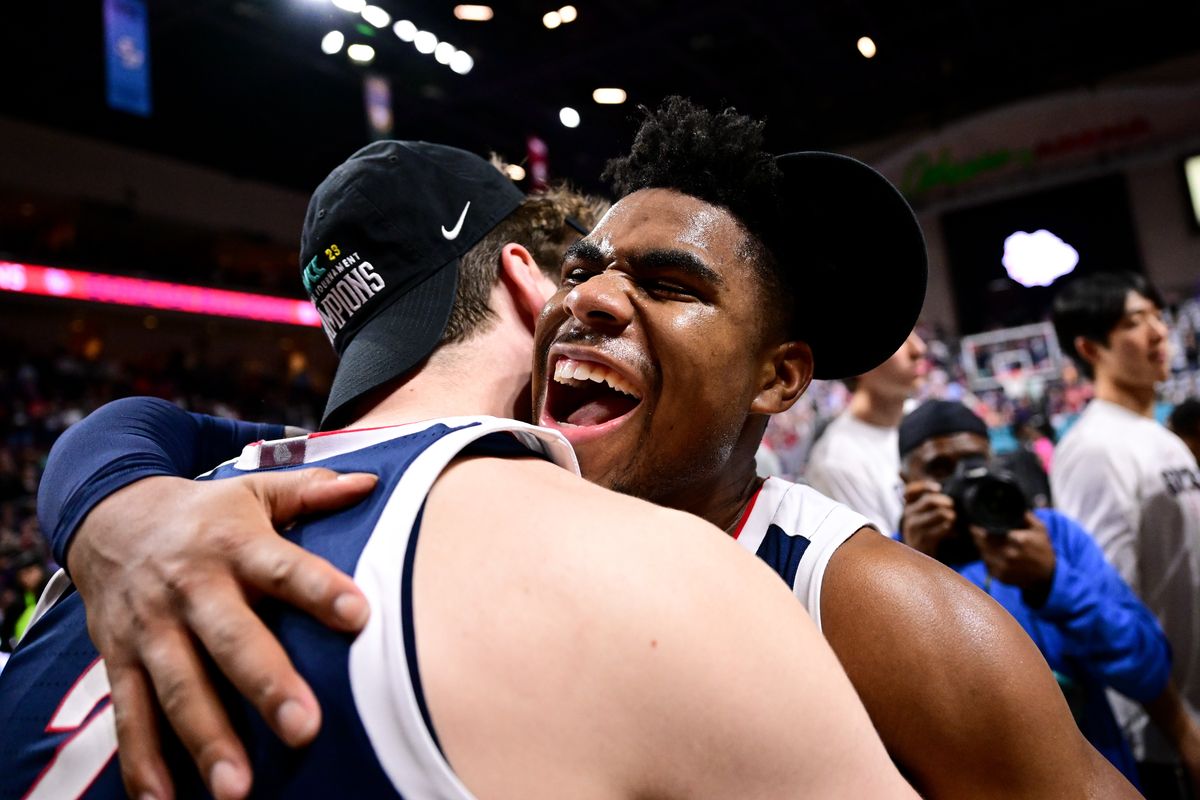 Gonzaga guard Malachi Smith yells as he embraces forward Drew Timme after the Bulldogs defeated Saint Mary’s 77-51 in the WCC Tournament championship in Las Vegas.  (Tyler Tjomsland/The Spokesman-Review)
