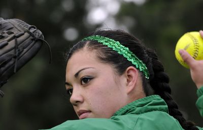 Lakeland softball pitcher Alisha Watson practices at the school in Rathdrum on Tuesday. She also plays second base for the Hawks. (Kathy Plonka / The Spokesman-Review)