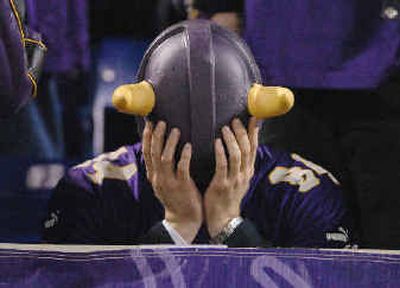 Vikings fans sought a place to hide after the tough loss.
(Associated Press / The Spokesman-Review)