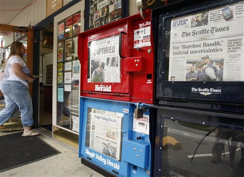 Newspaper front pages all contain the story of the capture of Colton Harris-Moore near his home in Camano Island, Wash., on Monday July 12, 2010. The 19-year-old 