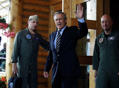 
Defense Secretary Donald Rumsfeld waves as he leaves for Ft. Wainwright in Fairbanks, Alaska on  Saturday. 
 (Associated Press / The Spokesman-Review)