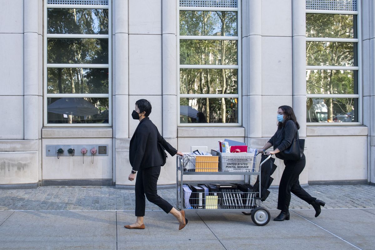 REMOVES REFERENCE TO R. KELLY - Paralegals arrive at the Brooklyn Federal Court House on Monday, Sept. 27, 2021, in New York.  (Brittainy Newman)