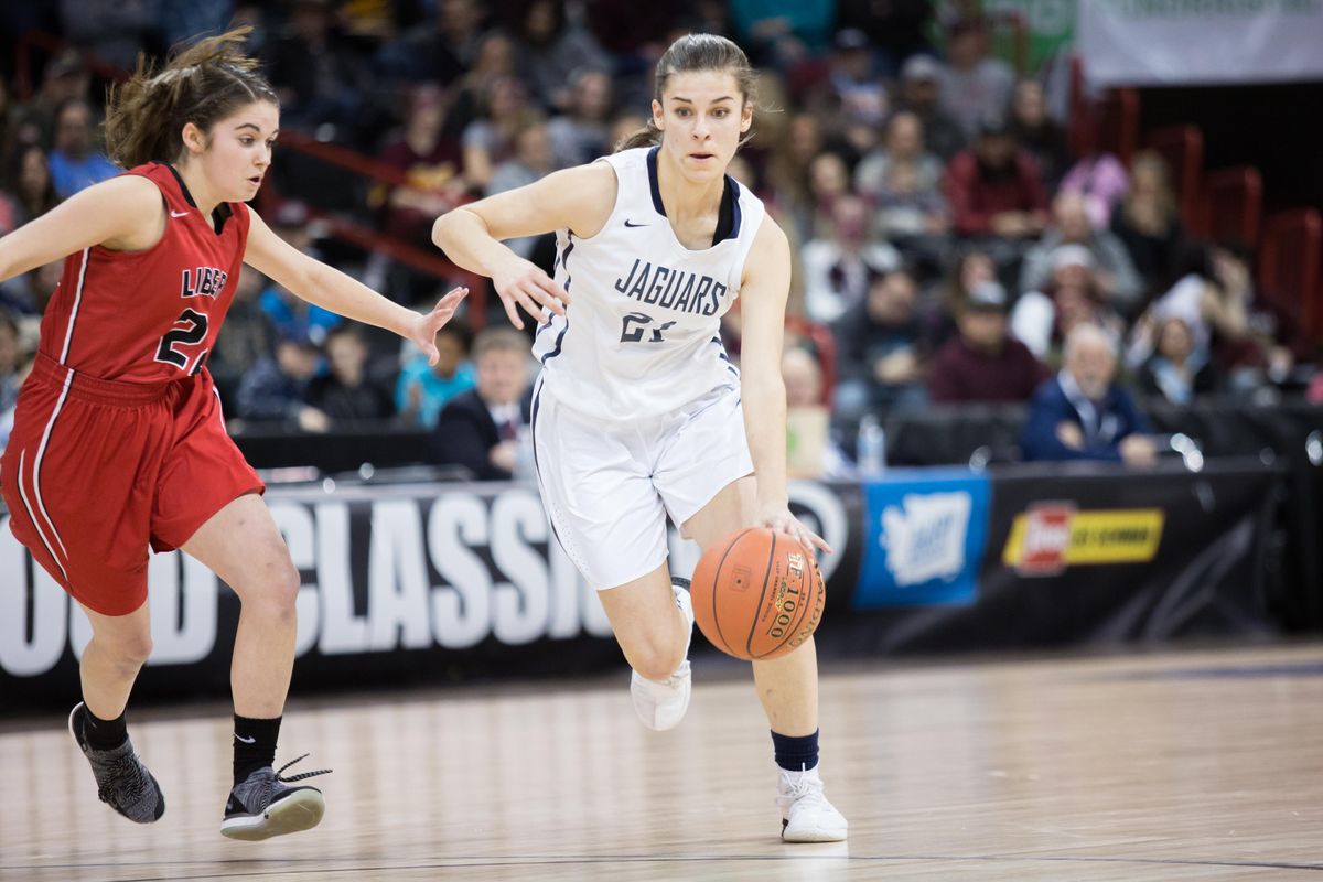 Mckenna Martinez (21) of Tri-Cities Prep drives up the court during the state 2B championship on Saturday, March 2, 2019 at the Spokane Arena. The Tri-Cities Prep Jaguars beat the Liberty (Spangle) Lancers 52-40. (Libby Kamrowski / The Spokesman-Review)