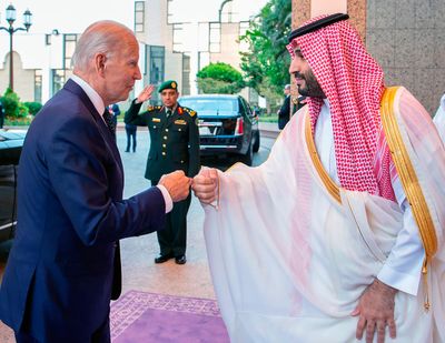 Crown Prince Mohammed bin Salman, right, welcomes President Joe Biden to the al-Salam Palace in Jeddah, Saudi Arabia, on Friday.  (SAUDI PRESS AGENCY)