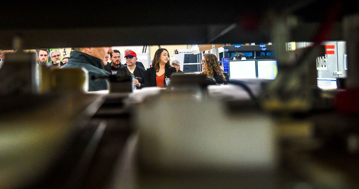 Members of the Association of Washington Business tour Altek Inc. in Liberty Lake on Wednesday as part of the association’s sixth annual manufacturing bus tour.  (KATHY PLONKA/THE SPOKESMAN-REVIEW)