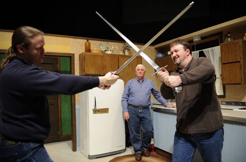 During auditions for “I Hate Hamlet,” fight coordinator Brian Rempel, left, and Ignite! Community Theatre’s artistic director, Scott Finlayson cross swords, while Richard Donnelly waits to audition for the role of John Barrymore. “I Hate Hamlet” opens April 12. (Colin Mulvany)