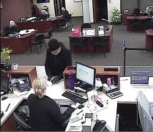 Surveillance snap shot of male robbing US Bank in downtown Coeur d'Alene Monday afternoon.