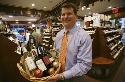 Chris Adams, executive vice president of Sherry-Lehmann, displays a $94 wine gift basket in New York.  (Associated Press / The Spokesman-Review)