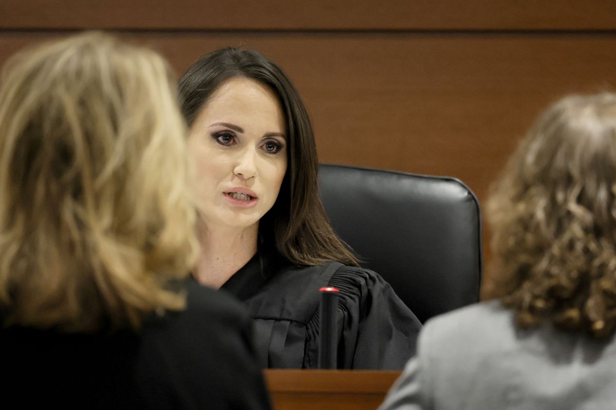 Judge Elizabeth Scherer speaks with Assistant State Attorney Carolyn McCann, left, and Assistant Public Defender Tamara Curtis during a sidebar discussion prior to jury pre-selection in the penalty phase of the trial of Marjory Stoneman Douglas High School shooter Nikolas Cruz at the Broward County Courthouse in Fort Lauderdale on Monday, April 25, 2022. Cruz previously plead guilty to all 17 counts of premeditated murder and 17 counts of attempted murder in the 2018 shootings.  (Amy Beth Bennett)