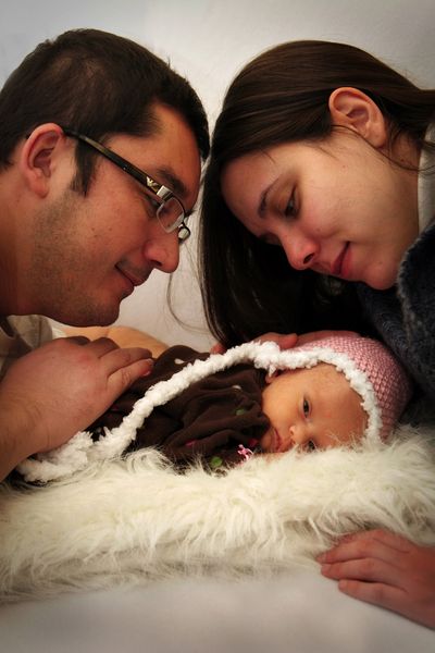 Duru Eroglu is pictured here with her parents, Umut Eroglu and mother Duygu Toygur Eroglu. The parents are from Turkey and were living in Spokane for university studies when their daughter was born Jan. 19 with a brain tumor that took her life.
Photo courtesy of Karin Knapp (Courtesy Forget-me-not)