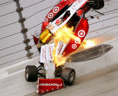 
Ryan Briscoe's car flips into the air and bursts into flames after being involved in an accident Sunday.
 (Associated Press / The Spokesman-Review)