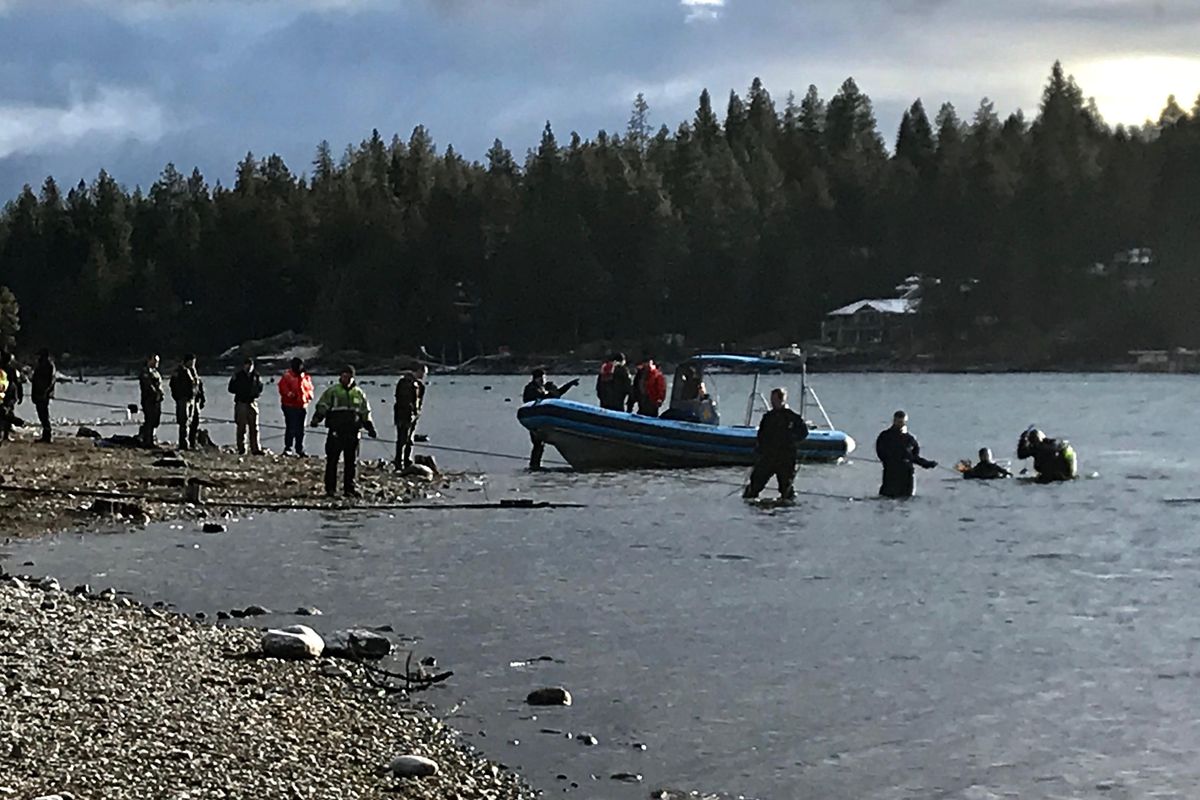 A woman was pulled from her submerged vehicle Monday, Jan. 7, 2019 after her car plunged into the Spokane River in Post Falls. (Kathy Plonka / The Spokesman-Review)