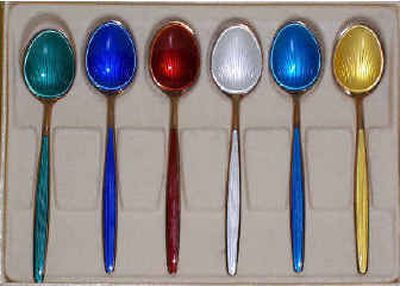 
These colorful 1950s enamel on silver spoons is valued at less than $100.
 (The Spokesman-Review)