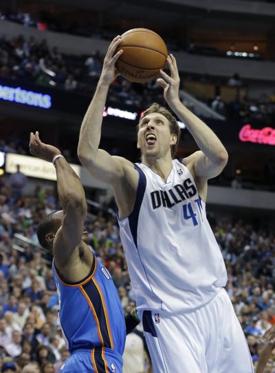 Dirk Nowitzki had 32 points and 10 rebounds in victory. (Associated Press)