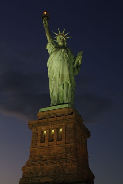 The Statue of Liberty is illuminated Friday for the first time since it was damaged by Superstorm Sandy. (Associated Press)