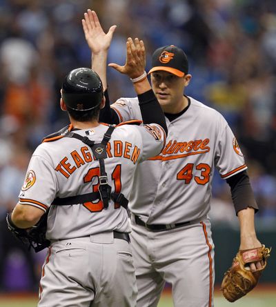 All-Star Jim Johnson (43) has anchored Baltimore’s stellar bullpen with 34 saves in 37 opportunities. (Associated Press)