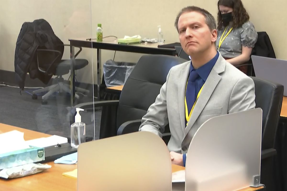 In this image from video, former Minneapolis police Officer Derek Chauvin listens as his defense attorney Eric Nelson gives closing arguments as Hennepin County Judge Peter Cahill preside Monday, April 19, 2021, in the trial of Chauvin at the Hennepin County Courthouse in Minneapolis. Chauvin is charged in the May 25, 2020 death of George Floyd.  (POOL)