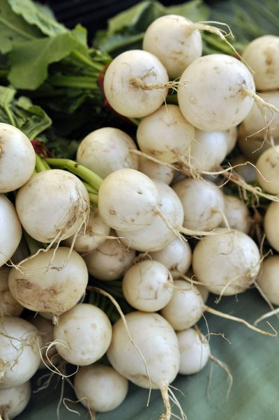 Small, sweet and tender Japanese turnips are more delicately flavored – and cuter – than their larger, purple-topped siblings. (Adriana Janovich)