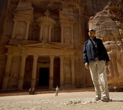 President Barack Obama stops to look at Al-Khazneh, or The Treasury, during his tour of the ancient city of Petra in Jordan on Saturday. (Associated Press)