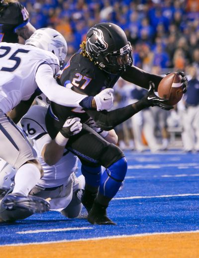 BSU’s Jay Ajayi, right, scores one of 4 TDs against Nevada. (Associated Press)