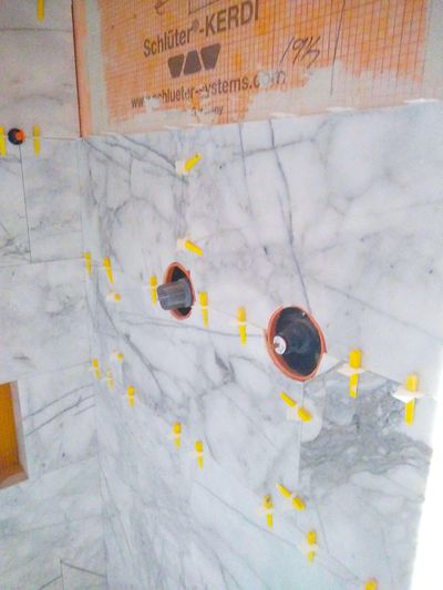 These large pieces of marble are in a master shower. This is not a beginner DIY project no matter what you’ve seen on TV cable shows! (Tim Carter)