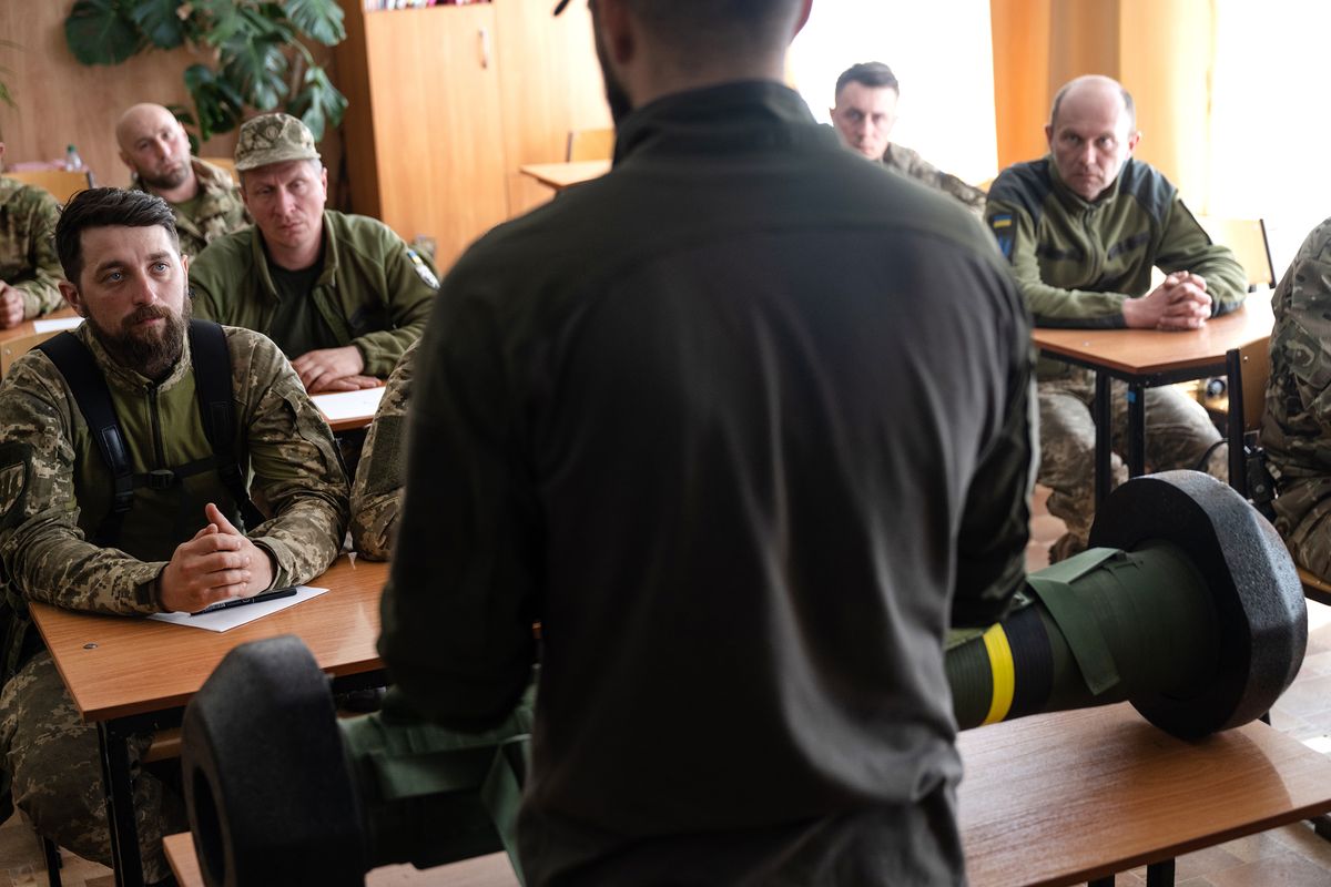 An American volunteer teaches Ukrainian soldiers how to use a Javelin at a base outside of Zaporizhzhia, Ukraine, April 28, 2022. Special Operations veterans are training Ukrainians near the front lines in the fight against Russia, despite warnings from the Pentagon.  (LYNSEY ADDARIO)