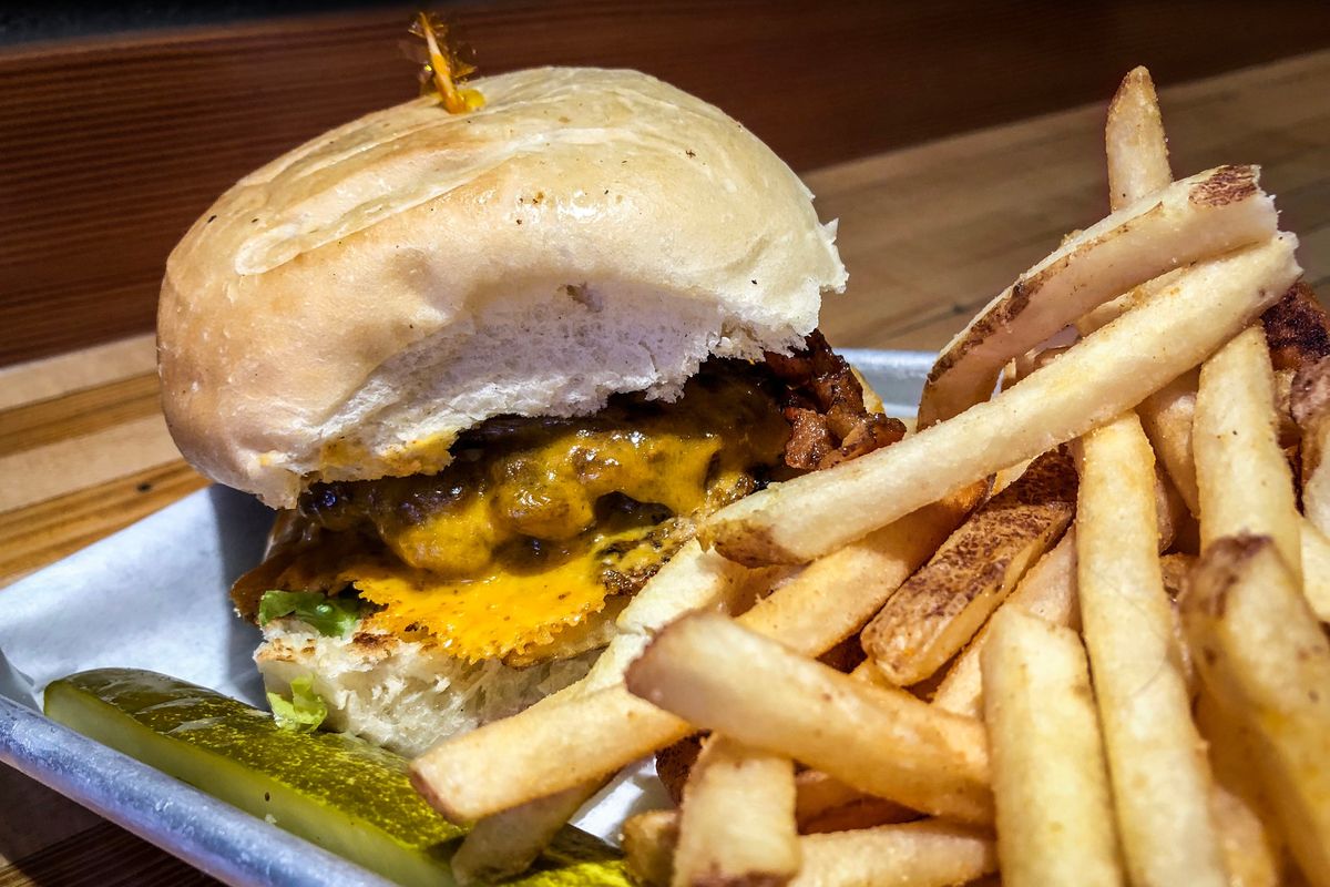 The Wisconsin from Wisconsinburger features fresh ground beef, sharp cheddar, lettuce, tomato, caramelized onions, with bacon added.  (DAN PELLE/THE SPOKESMAN-REVIEW)