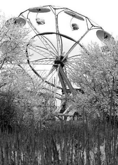 
Paradise Amusements of Post Falls set up a two-day carnival last week on land owned by developer Harlan Douglass at 44th Avenue and Regal Street.  
 (Ingrid Lindemann / The Spokesman-Review)