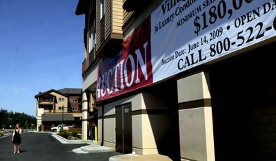 kathypl@spokesman.com The Village at Riverstone in Coeur d’Alene is shown  Tuesday. Thirty-six condos in the development will be auctioned  July 12. (Kathy Plonka / The Spokesman-Review)