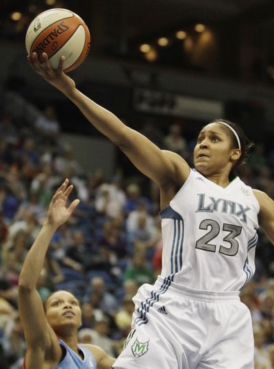 Minnesota’s Maya Moore goes to the basket against Atlanta. (Associated Press)