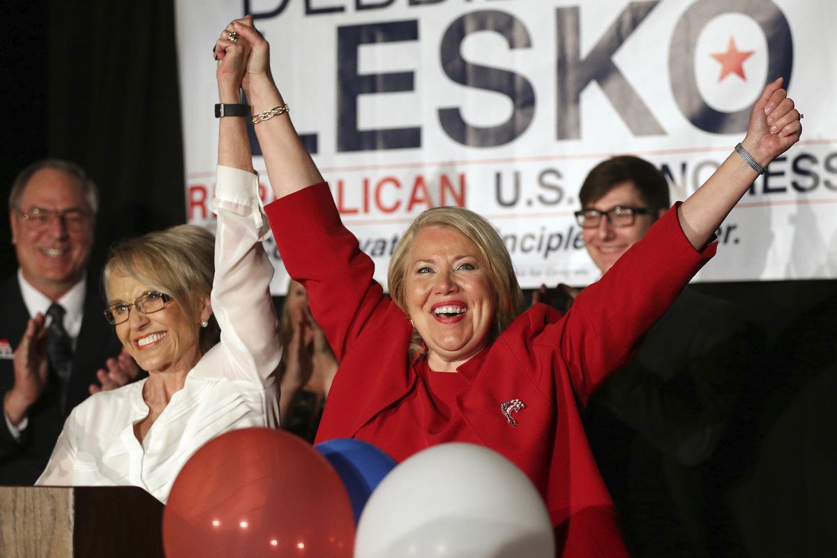 Republican U.S. Congressional candidate Debbie Lesko, right, celebrates her win with former Arizona Gov. Jan Brewer at her home, Tuesday, April 24, 2018, in Peoria, Ariz. Lesko ran against Democratic candidate Hiral Tipirneni for Arizona's 8th Congressional District seat being vacated by U.S. Rep. Trent Franks, R-Arizona. (Matt York / AP)