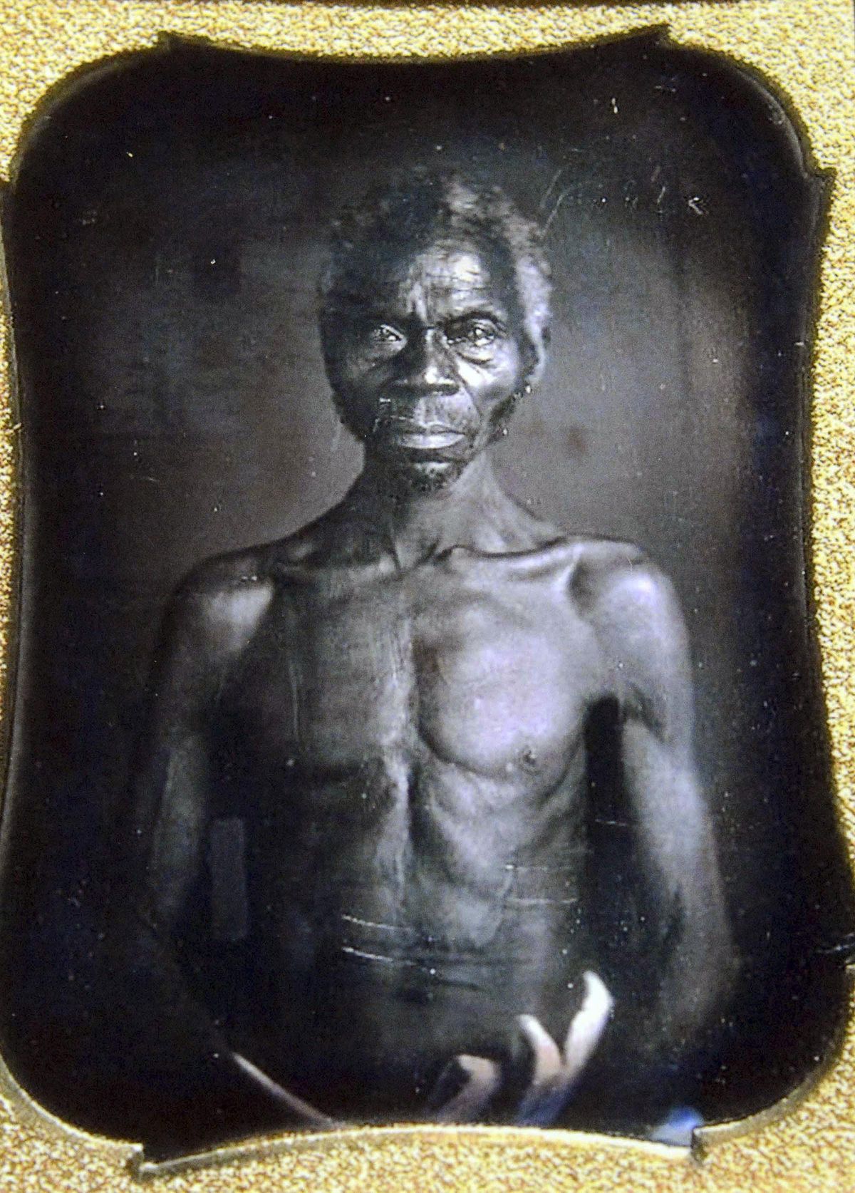This July 17, 2018 copy of a photo shows a 1850 Daguerreotype of Renty, a South Carolina slave who Tamara Lanier, of Norwich, Conn., said is her family’s patriarch. The portrait was commissioned by Harvard biologist Louis Agassiz, whose ideas were used to support the enslavement of Africans in the United States. Lanier filed a lawsuit on Wednesday, March 20, 2019, in Massachusetts state court, demanding that Harvard turn over the photo and pay damages. (John Shishmanian / AP)