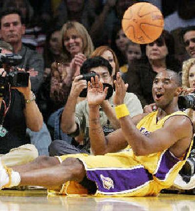 
Lakers' Kobe Bryant played in his first game this season and scored 23 points. 
 (Associated Press / The Spokesman-Review)