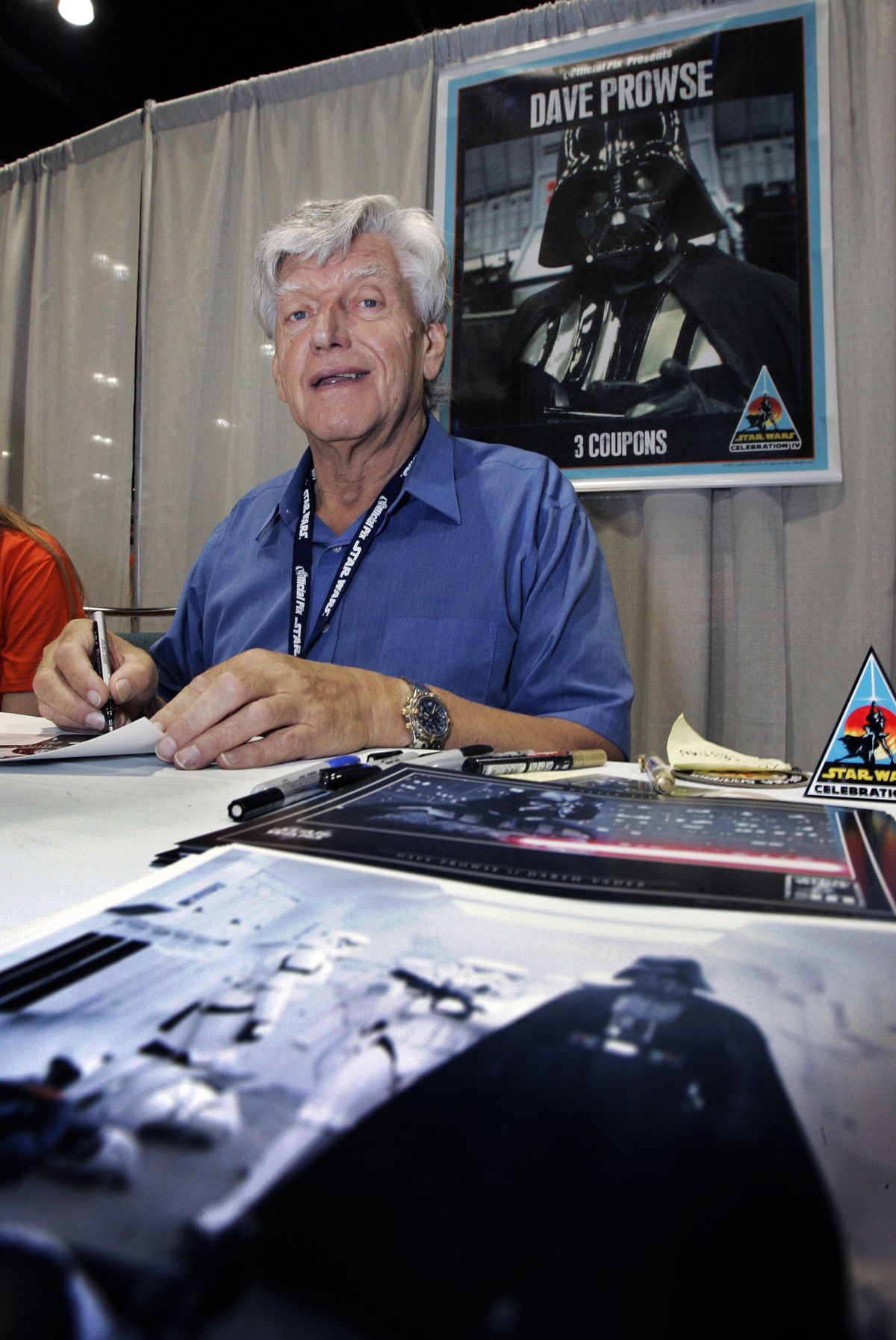 Actor David Prowse, who was the man in the black Darth Vader suit in the first "Star Wars" film, signs autographs at Star Wars Celebration IV, marking the 30th anniversary of the release of the first film in the "Star Wars" saga, in Los Angeles on May 26, 2007. British actor Prowse died at age 85 on Saturday, according to an announcement by his agent on Sunday.  (Reed Saxon)