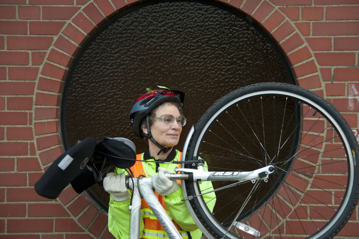 By bike: Sharon Yablon commutes from Spokane’s North Side to her job on the 700 block of East Sprague. (Dan Pelle)