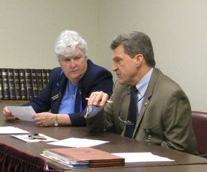 Rep. Phyllis King, D-Boise, left, and Stan Olson, superintendent of the Boise School District, right, discuss the impact of proposed state budget cuts on the Boise district. Boise-area lawmakers invited local school officials in to discuss how the cuts would affect local schools; House Education Chairman Bob Nonini, R-Coeur d'Alene, said he encourages all lawmakers to talk with their local school officials. Nonini said he's hoping to unveil legislation later this week to change state laws to allow the cuts. 2/9/09 (Betsy Russell / The Spokesman-Review)