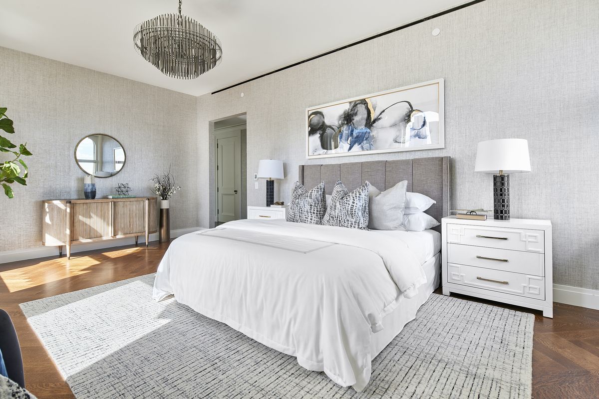 Neutralâ€“colored grass cloth ads both elegance and texture in this master bedroom. (Handout/TNS)  (Handout)
